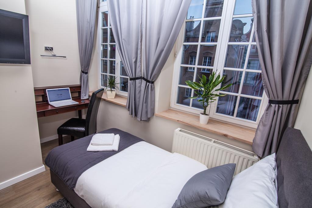 Kamer met 1 Groot Bed of 2 Aparte Bedden en Uitzicht op de Stad