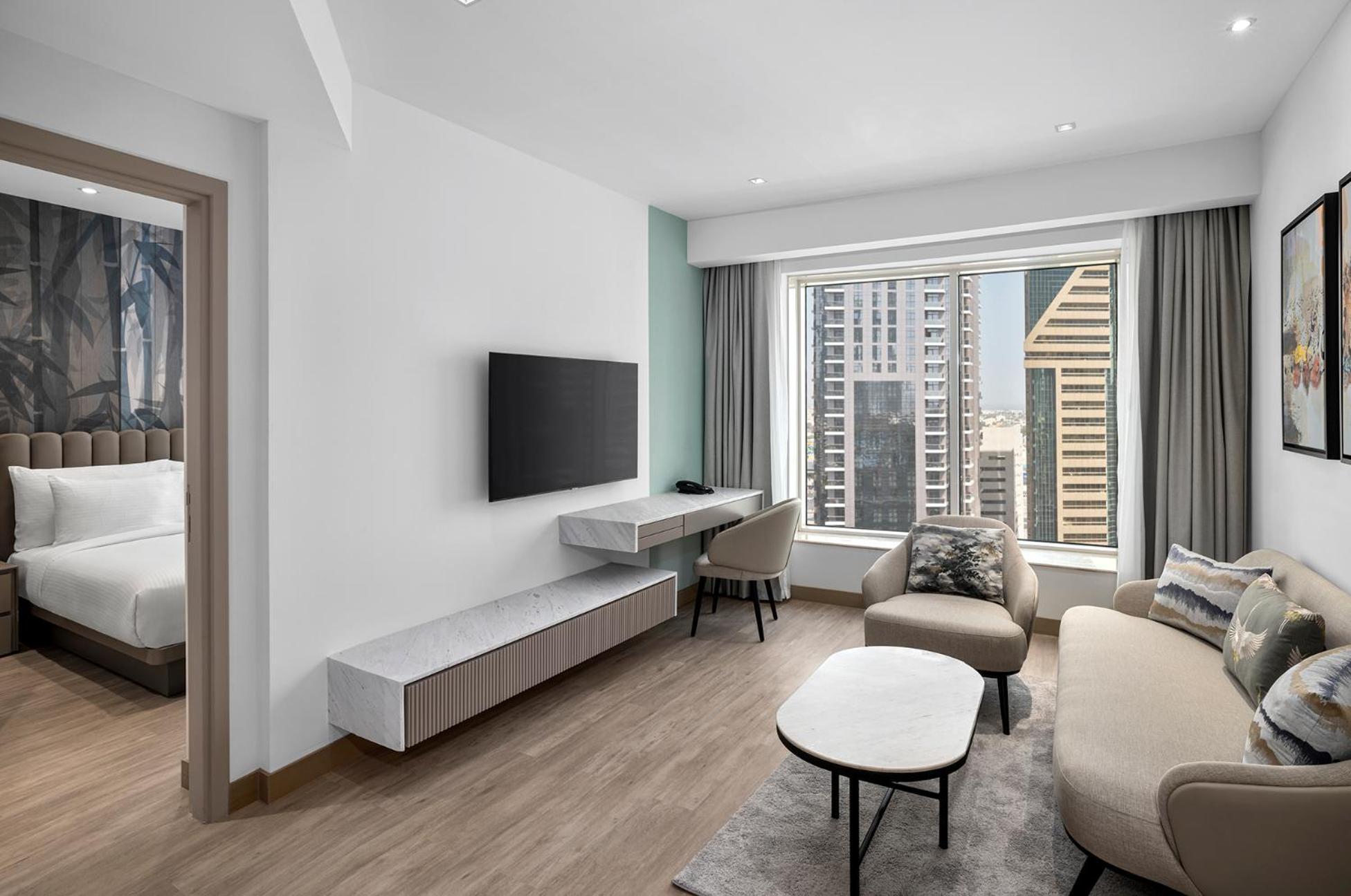 One Bedroom Suite with 1 Queen Bed - City View - Includes 20% Off Food & Beverage