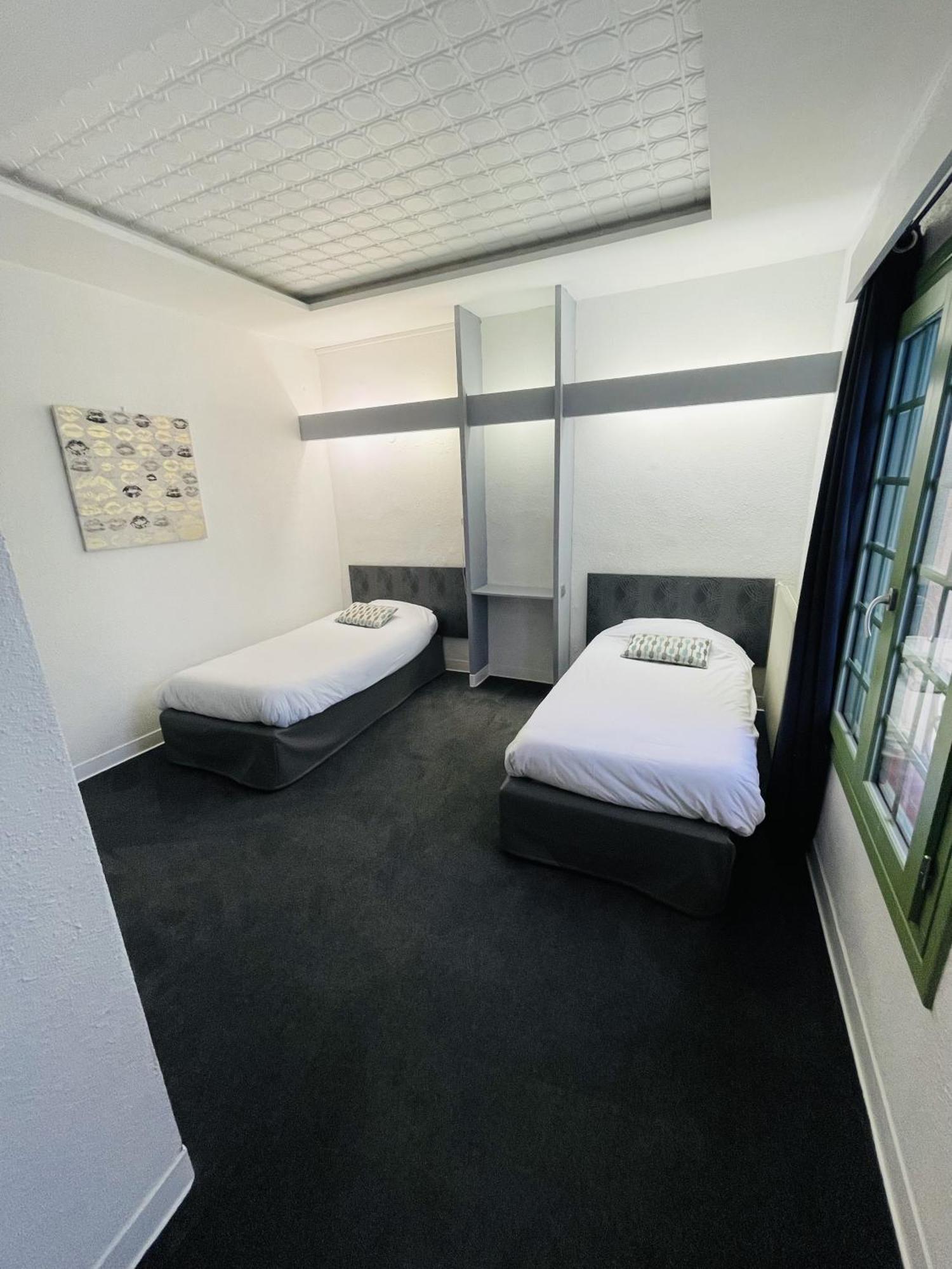 Tweepersoonskamer met 2 Aparte Bedden