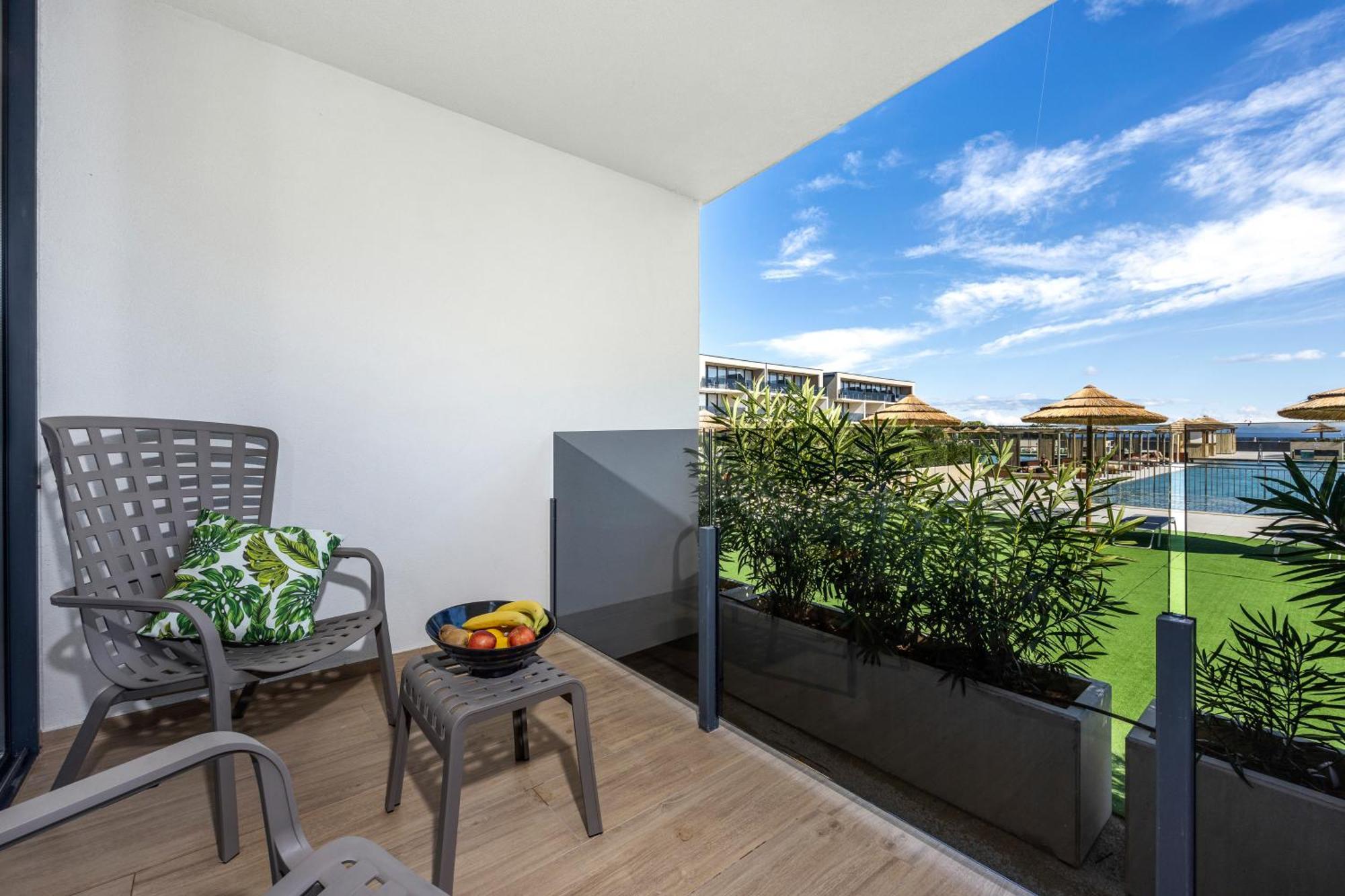 Superior Vierpersoonskamer met Balkon - Zwembadzijde