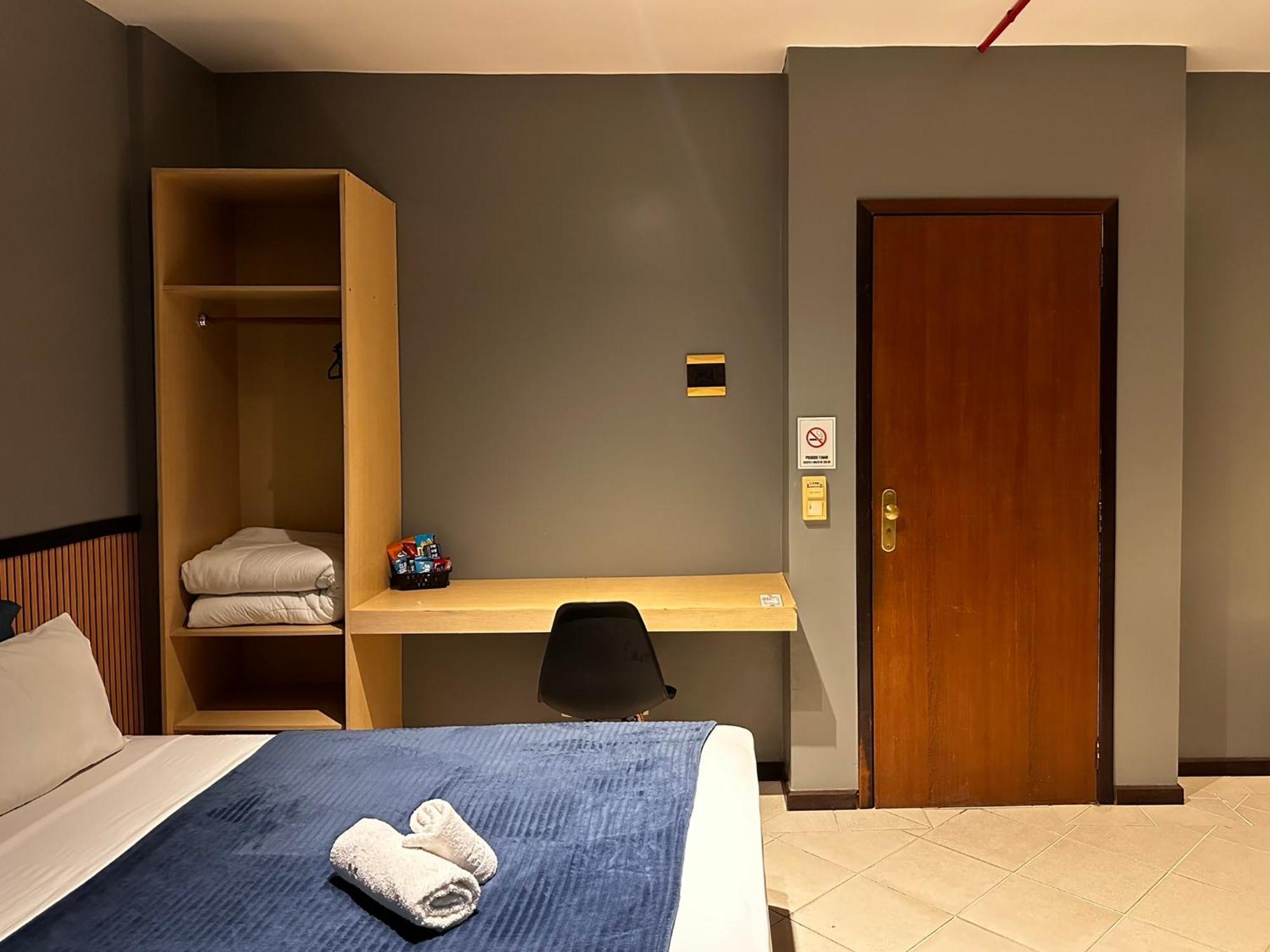 Quarto Triplo Executivo