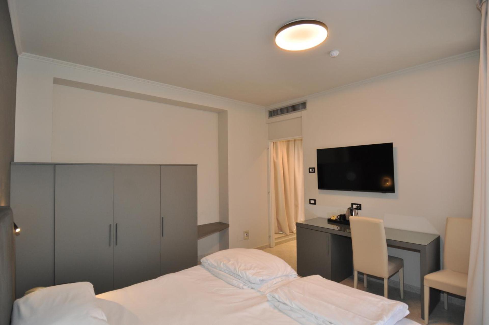 Luxe Kamer met 1 of 2 Bedden en Balkon