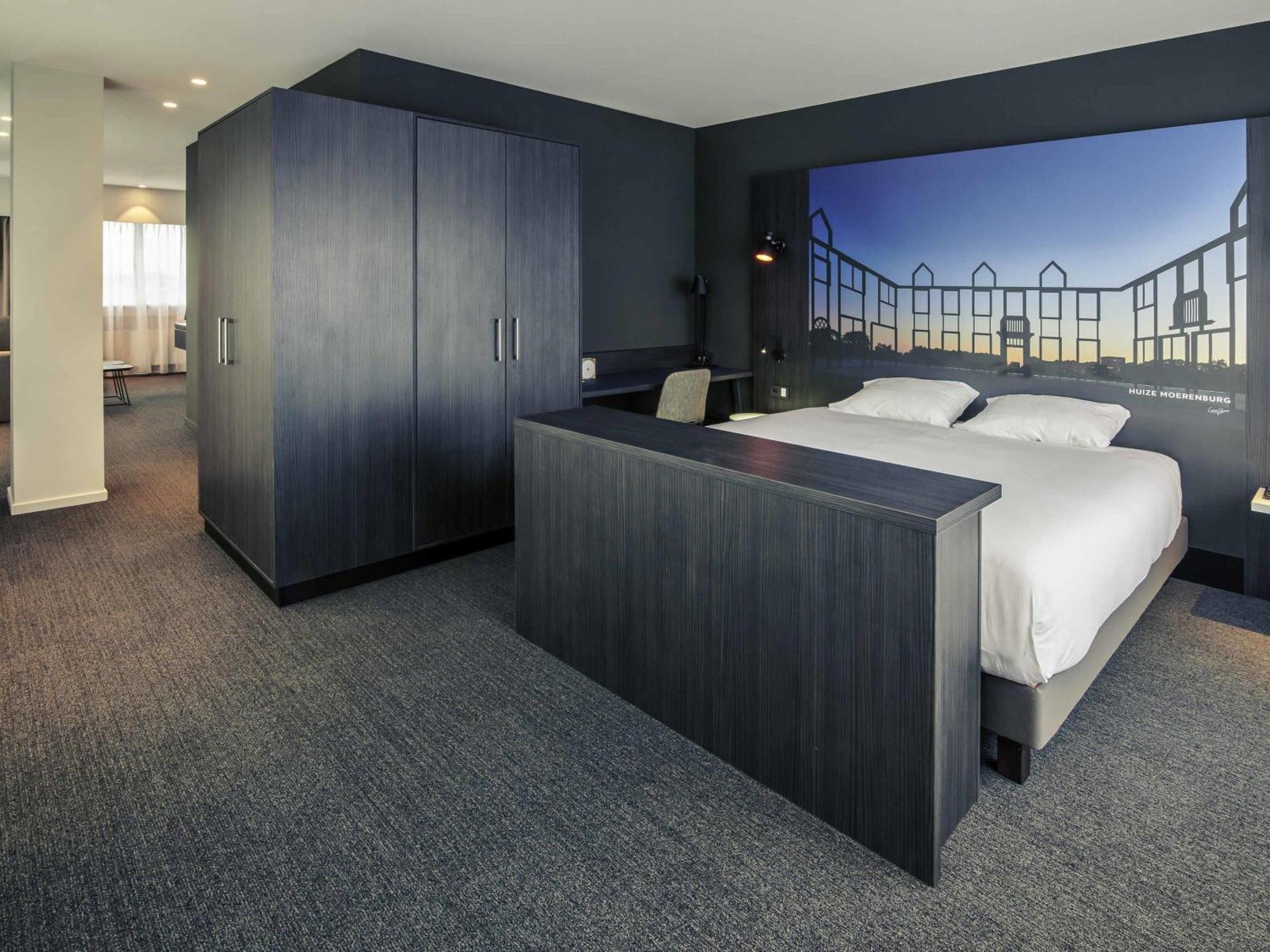 Executive Suite met Tweepersoonsbed en Slaapbank