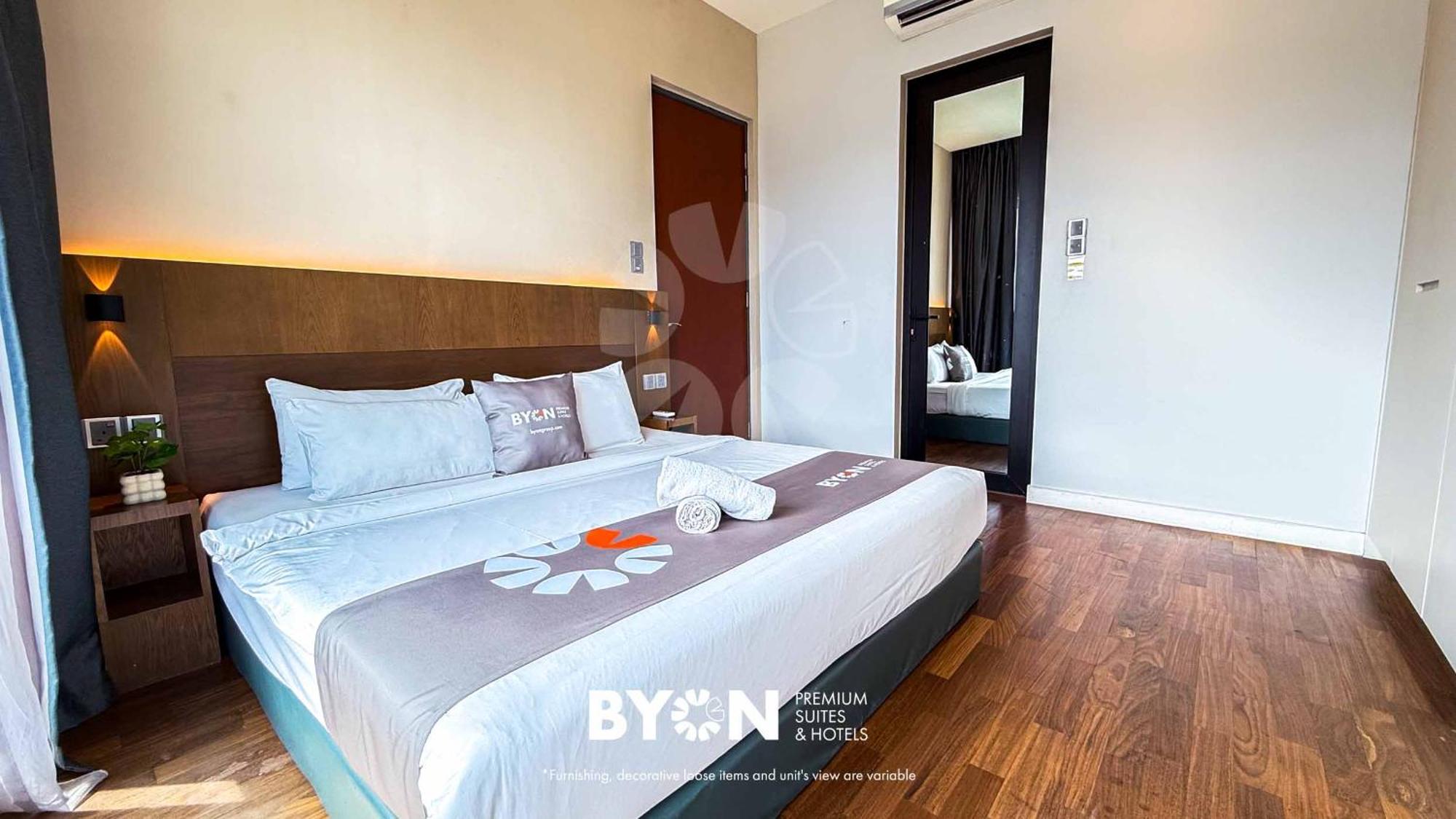 Premium One-Bedroom Triple Bed Suite
