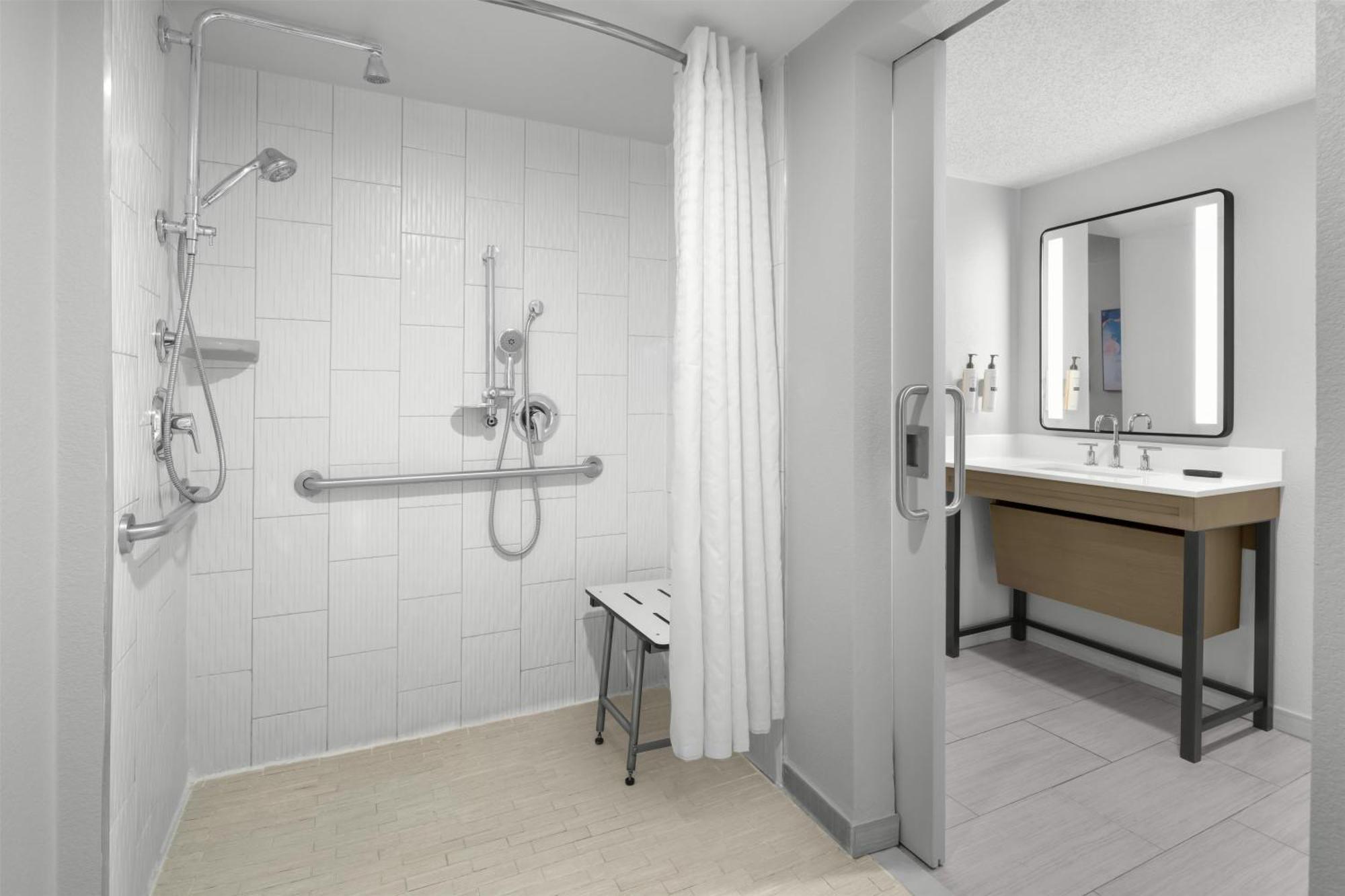 One-Bedroom Suite with Two Double Beds and Roll-In Shower - Mobility Accessible Bed