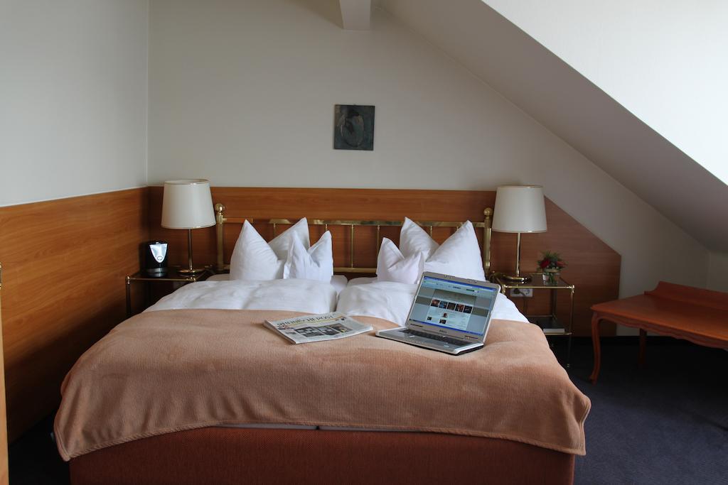 Doppel- oder Zweibettzimmer