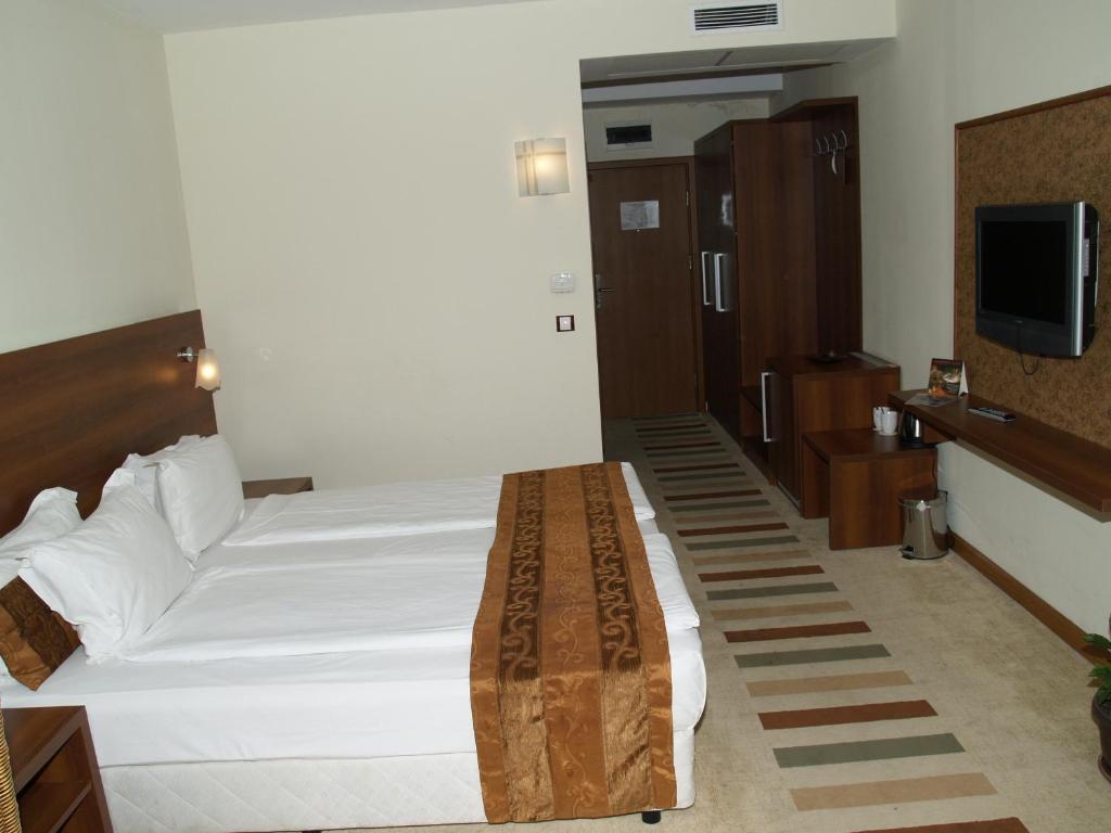 Tweepersoonskamer met 1 of 2 Bedden en een Extra Bed