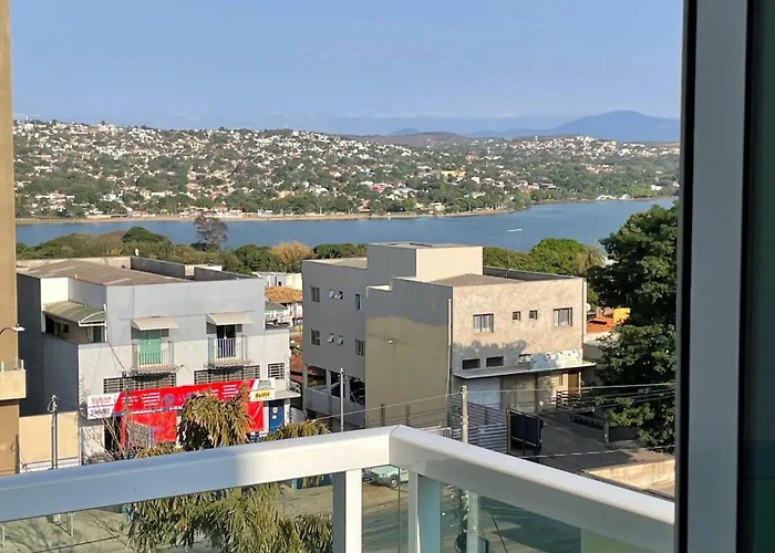 Apto 408, Aeroporto 14km, com wi-fi, self check-in e varandinha