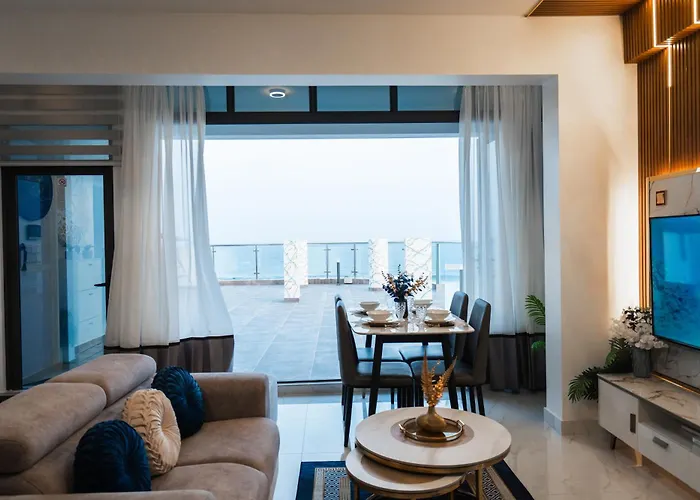Aina Residency Beachfront Hotel