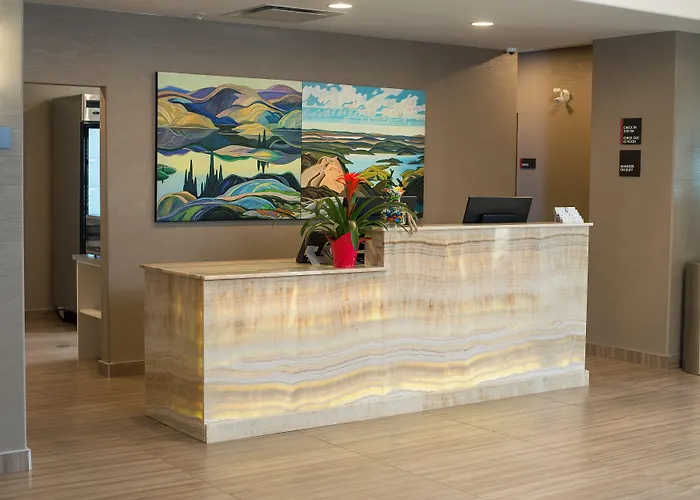 Encore Suites By Service Plus Inns