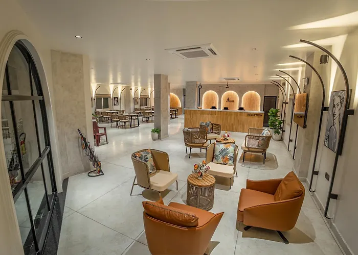 Aura Inn & Suites