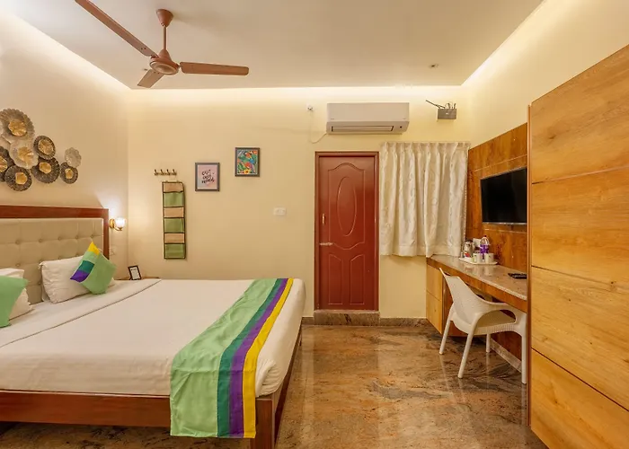Treebo Grace Inn, 3 Min Walk From Promenade Beach
